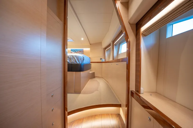 Passion Yacht Photos Pics Luxurious interior of 2019 Horizon PC52 yacht with modern design and elegant wood finishes.