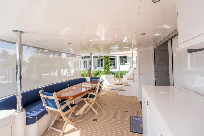 Passion Yacht Photos Pics Luxurious 2019 Horizon PC52 yacht interior with elegant dining area and modern design.