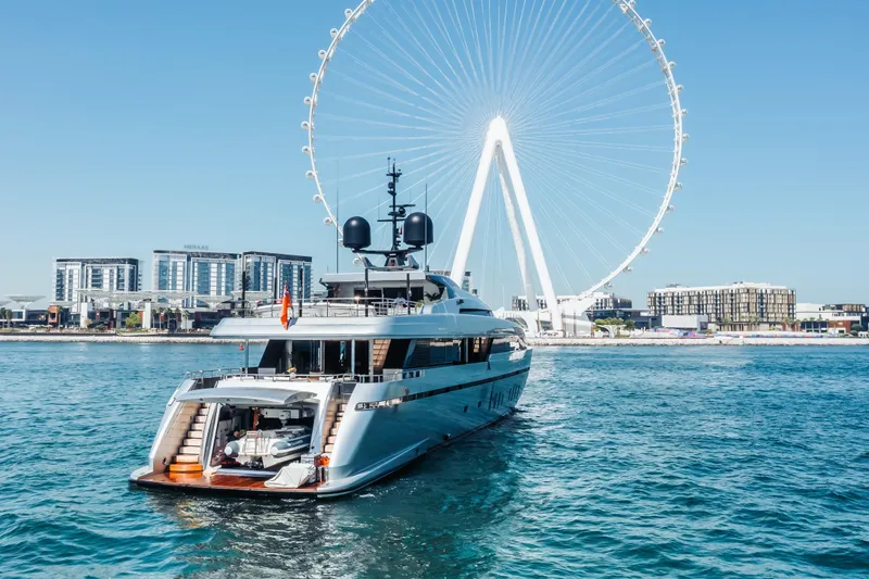  Yacht Photos Pics Luxurious 2018 Sanlorenzo 40Alloy yacht cruising near a Ferris wheel on a sunny day.