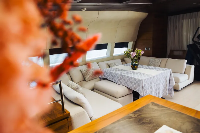  Yacht Photos Pics Luxurious interior of 2018 Sanlorenzo 40Alloy yacht with elegant seating and floral centerpiece.