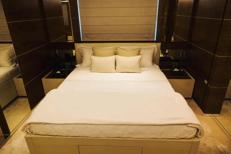  Yacht Photos Pics Luxurious bedroom interior on 2018 Sanlorenzo 40Alloy yacht, featuring elegant bedding and modern design.