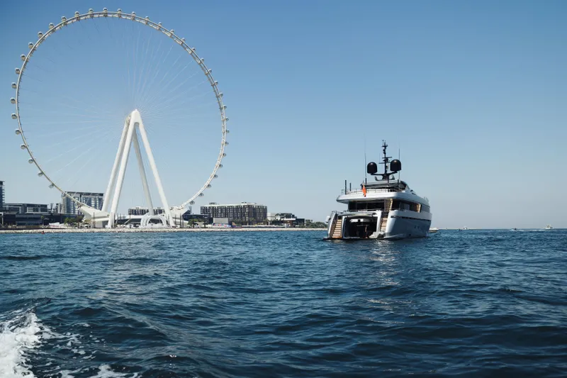  Yacht Photos Pics Sanlorenzo 40Alloy yacht cruising near a large Ferris wheel, 2018 model.