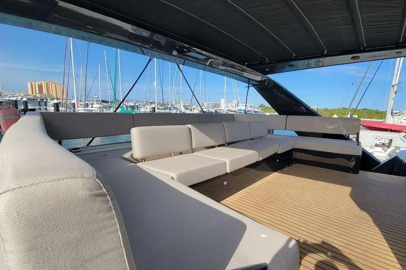  Yacht Photos Pics Spacious deck seating on 2022 Hussar WAVE 50 yacht in marina.