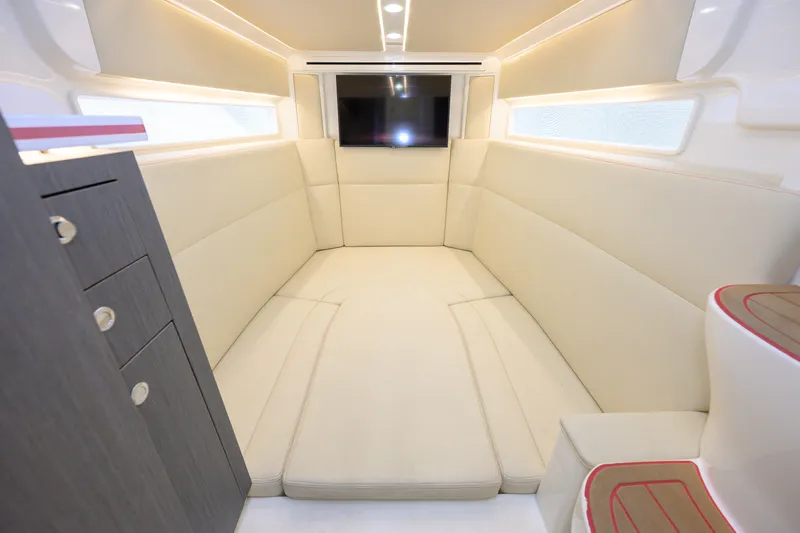  Yacht Photos Pics Luxurious interior of 2022 SeaVee 450Z boat with plush seating and modern amenities.