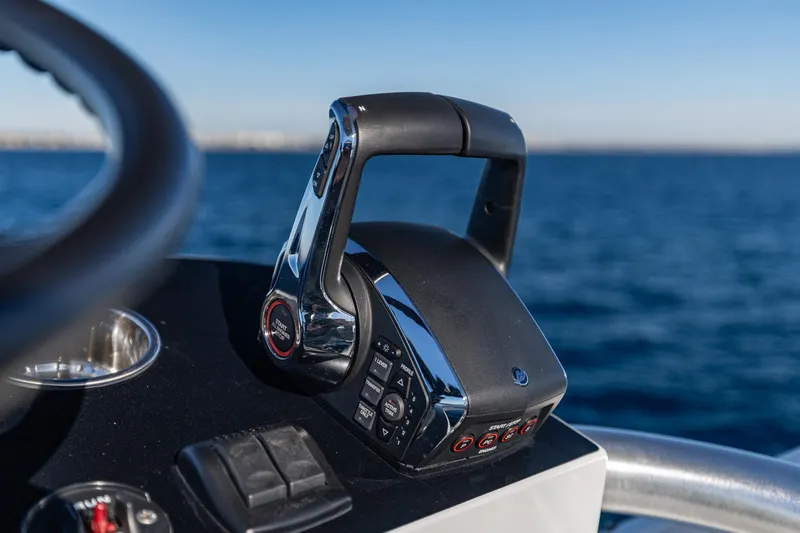  Yacht Photos Pics Throttle control on 2026 SeaVee 420Z boat, with ocean in background.