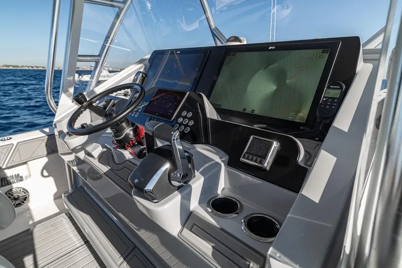  Yacht Photos Pics Helm of 2026 SeaVee 420Z boat with advanced navigation and control systems.