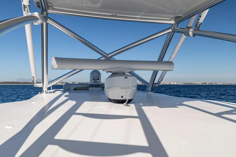  Yacht Photos Pics 2026 SeaVee 420Z boat radar system on open water, clear blue sky.