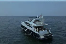  Yacht Photos Pics Luxury Princess 67 Flybridge yacht, 2008 model, cruising on open sea.