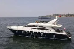  Yacht Photos Pics 2008 Princess 67 Flybridge yacht cruising on open water.