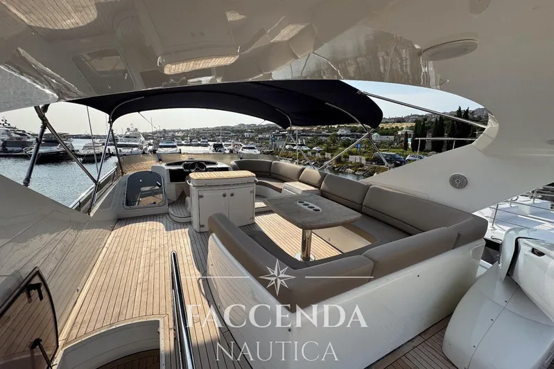  Yacht Photos Pics Luxurious 2008 Princess 67 Flybridge yacht with spacious seating and elegant design.