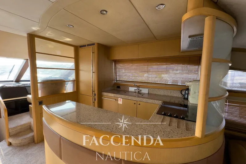  Yacht Photos Pics Luxurious interior of 2008 Princess 67 Flybridge yacht with modern kitchen design.