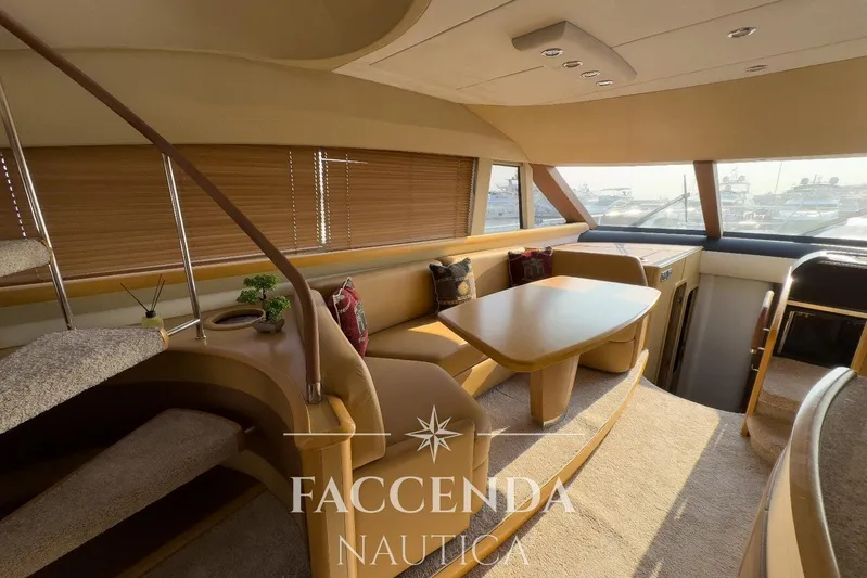  Yacht Photos Pics Luxurious interior of 2008 Princess 67 Flybridge yacht with elegant seating and dining area.