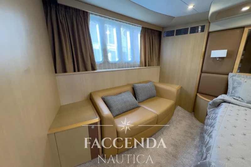  Yacht Photos Pics Luxurious interior of 2008 Princess 67 Flybridge yacht with cozy seating and elegant decor.