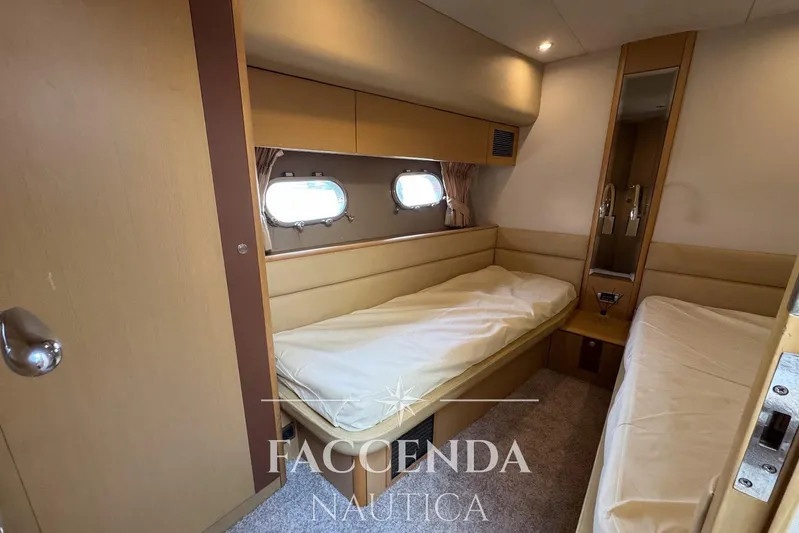  Yacht Photos Pics Luxurious cabin interior of 2008 Princess 67 Flybridge yacht with twin beds.