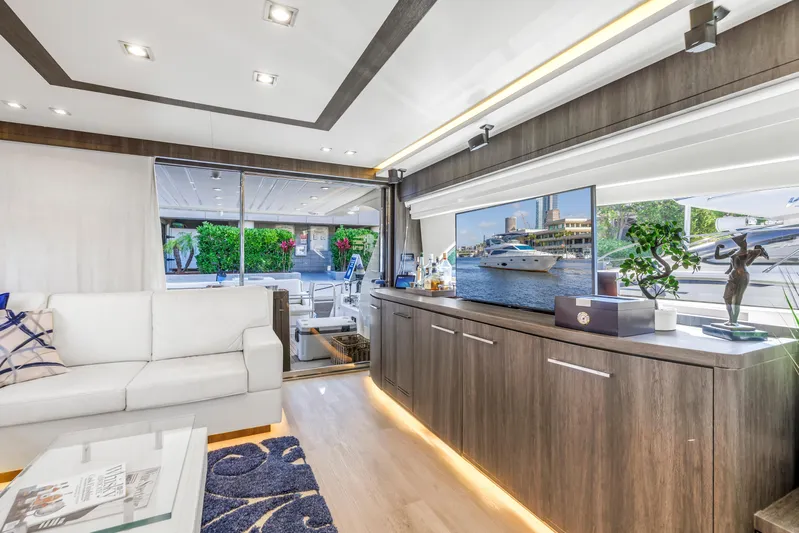 Solaris Yacht Photos Pics Luxurious interior of 2009 Uniesse 65 MY yacht with modern decor and large windows.