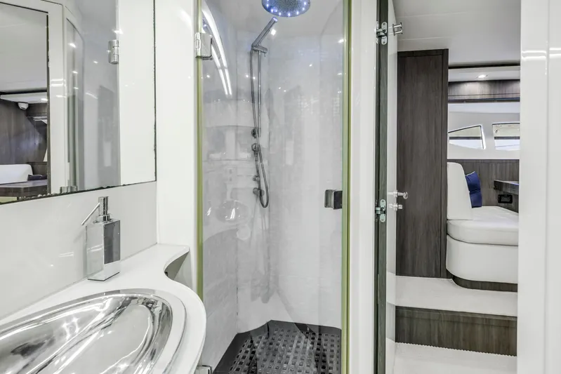 Solaris Yacht Photos Pics Luxurious bathroom interior of 2009 Uniesse 65 MY yacht with modern shower and sink.