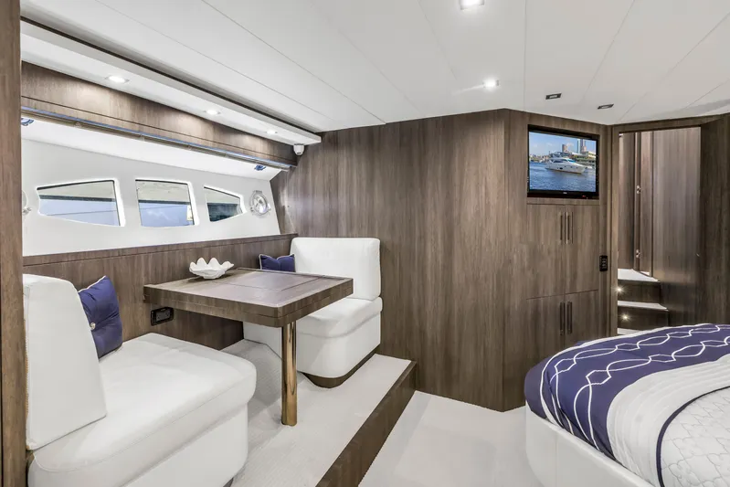 Solaris Yacht Photos Pics Luxurious interior of 2009 Uniesse 65 MY yacht with elegant seating and modern decor.