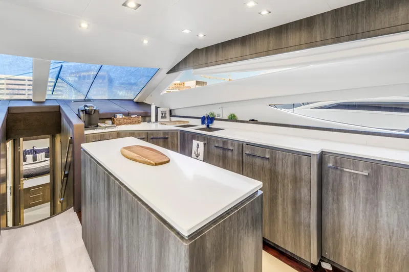 Solaris Yacht Photos Pics Luxurious kitchen interior of 2009 Uniesse 65 MY yacht with modern design elements.