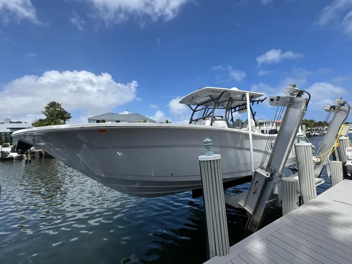 Keri B III Yacht Photos Pics 2023 Sea Fox 328 Commander boat docked, showcasing sleek design and modern features.