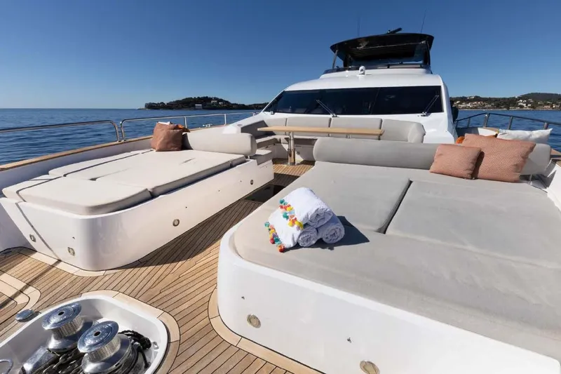  Yacht Photos Pics Luxurious Sunseeker 28 Metre Yacht 2013 with spacious deck and sun loungers on open sea.
