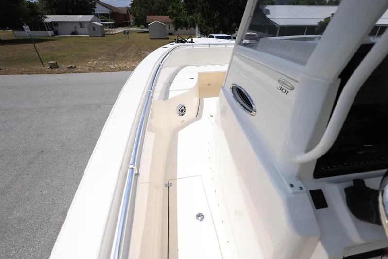  Yacht Photos Pics 2022 Cobia 301 Center Console boat deck with sleek design and spacious layout.