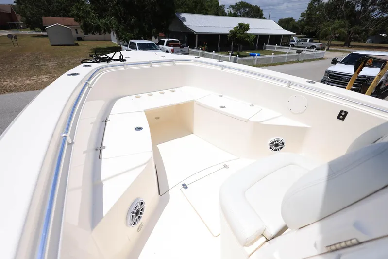  Yacht Photos Pics 2022 Cobia 301 Center Console boat with spacious seating and sleek design.