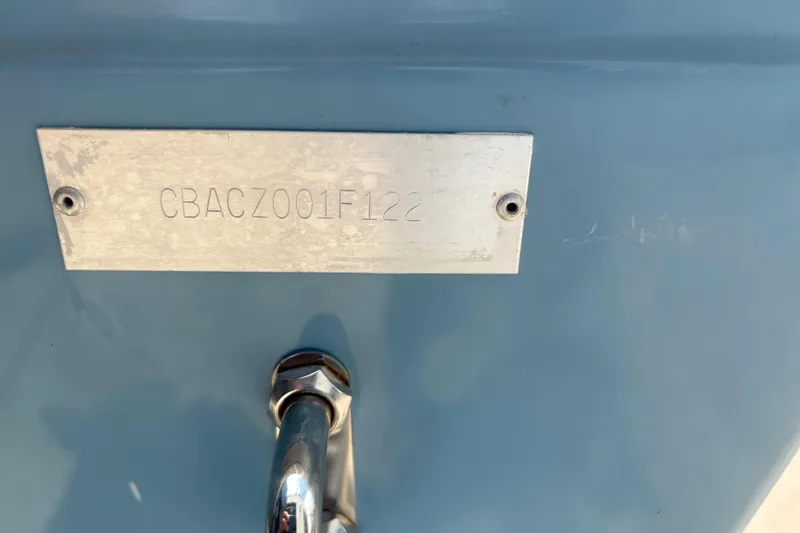  Yacht Photos Pics 2022 Cobia 301 Center Console boat identification plate with serial number.