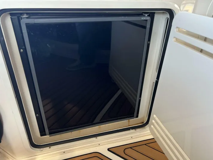 Moderation Yacht Photos Pics Open refrigerator on a 2001 Sea Ray 56 Sedan Bridge yacht.