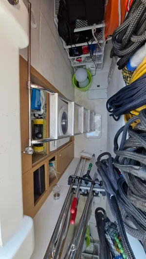  Yacht Photos Pics Storage area on a 2012 Princess V57 yacht with ropes and equipment.