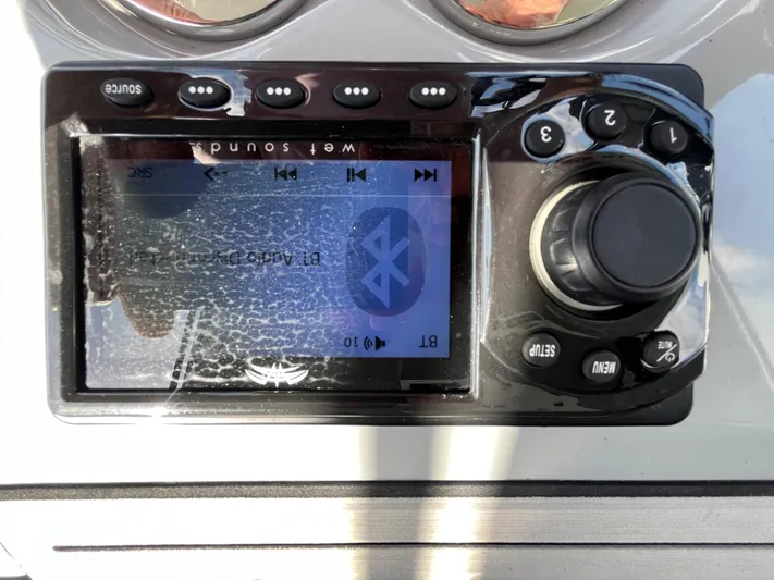  Yacht Photos Pics Close-up of a Seapro 320 DLX 2022 boat stereo system with Bluetooth connectivity.