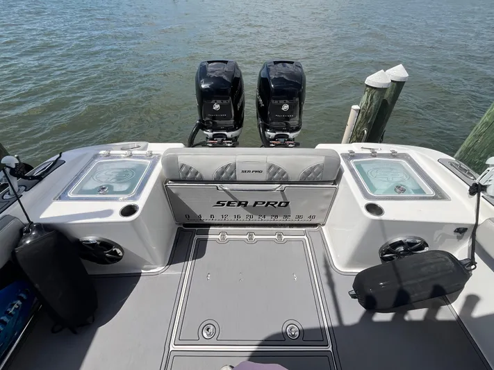  Yacht Photos Pics 2022 Seapro 320 DLX boat with dual engines docked on water.