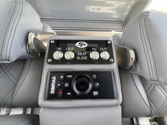  Yacht Photos Pics Control panel of 2022 Seapro 320 DLX with seat slide and Simrad system.