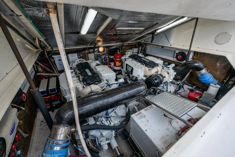 Sore Subject Yacht Photos Pics Engine room of 2007 Albemarle 36 Express with dual CAT engines and equipment.