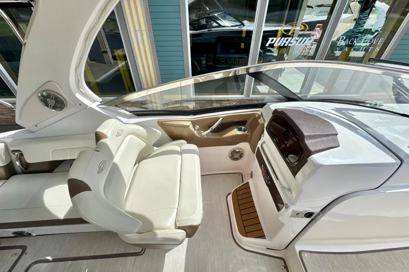  Yacht Photos Pics 2017 Chaparral 337 SSX boat interior with luxurious seating and modern dashboard.