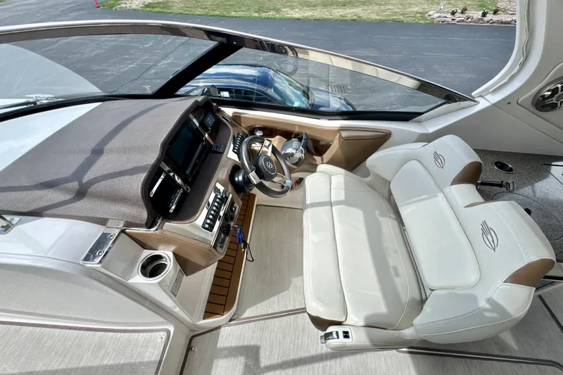  Yacht Photos Pics 2017 Chaparral 337 SSX boat interior with modern dashboard and plush seating.