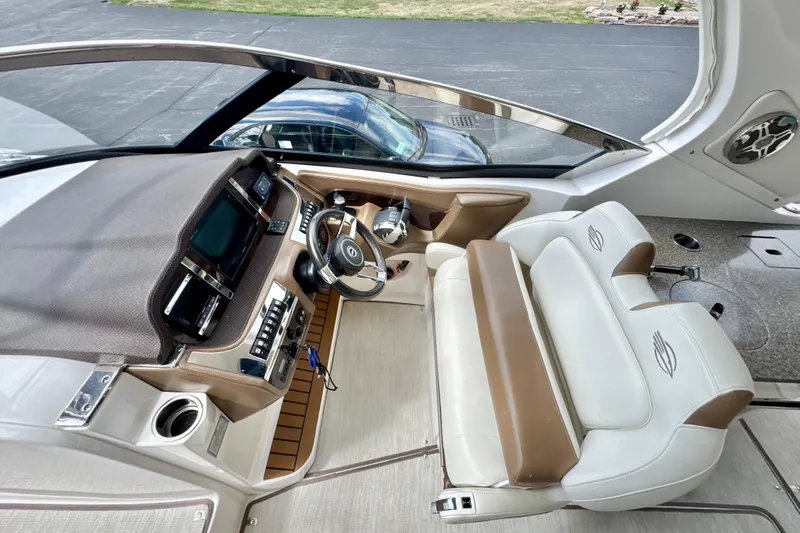  Yacht Photos Pics 2017 Chaparral 337 SSX boat interior with modern dashboard and plush seating.