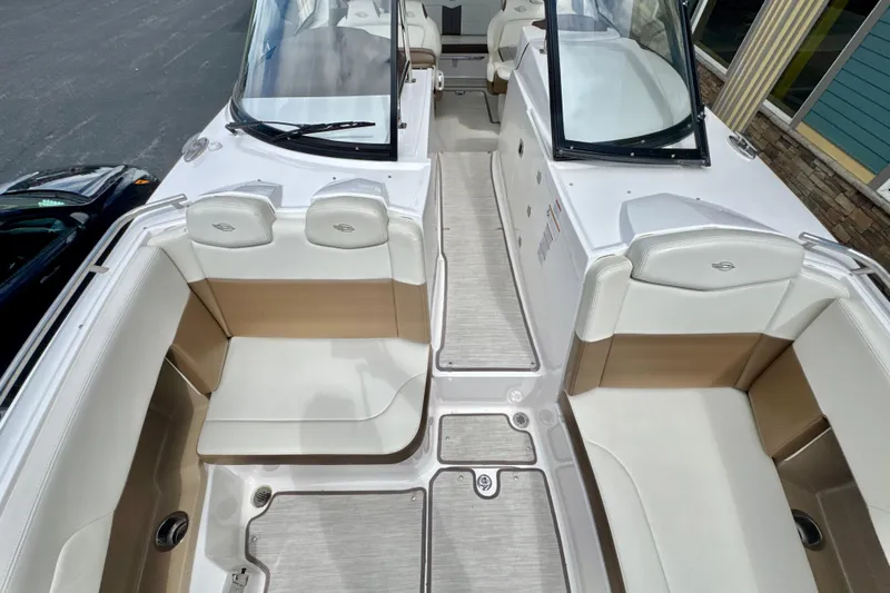 Yacht Photos Pics 2017 Chaparral 337 SSX boat interior with white and tan seating.