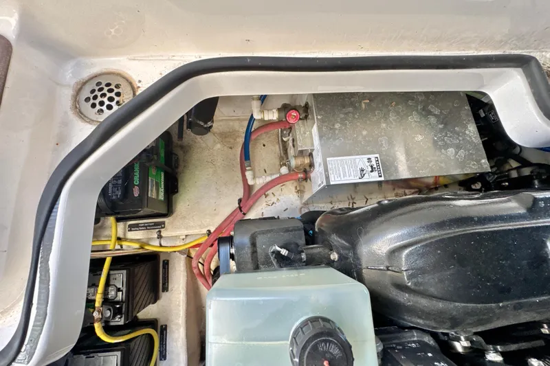  Yacht Photos Pics Engine compartment of a 2017 Chaparral 337 SSX boat, showing batteries and wiring.