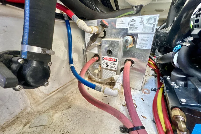  Yacht Photos Pics Engine compartment of 2017 Chaparral 337 SSX with wiring and warning labels.