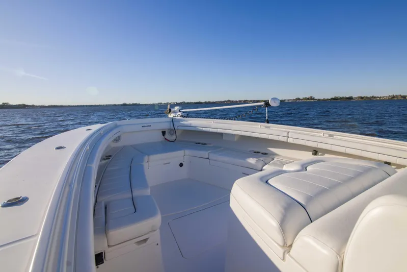 Wound Up II Yacht Photos Pics 2016 Regulator 41 boat interior with white seating on open water.