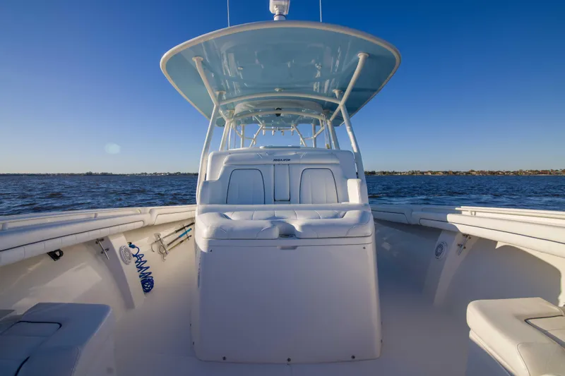 Wound Up II Yacht Photos Pics 2016 Regulator 41 boat on open water, featuring spacious seating and sleek design.
