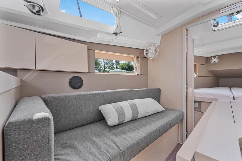 Eugenia Yacht Photos Pics Interior of 2021 Beneteau Oceanis 35.1 yacht, featuring modern seating and natural light.