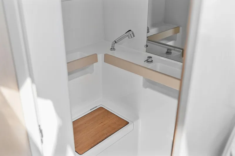 Eugenia Yacht Photos Pics Modern bathroom interior of 2021 Beneteau Oceanis 35.1 yacht with sleek fixtures.