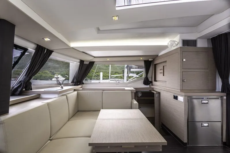 Pegasus Yacht Photos Pics Luxurious interior of 2022 Fountaine Pajot Astrea 42 catamaran with modern furnishings.