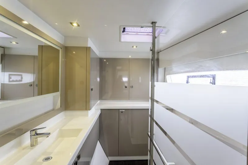 Pegasus Yacht Photos Pics Modern bathroom interior of 2022 Fountaine Pajot Astrea 42 yacht, featuring sleek design and ample lighting.