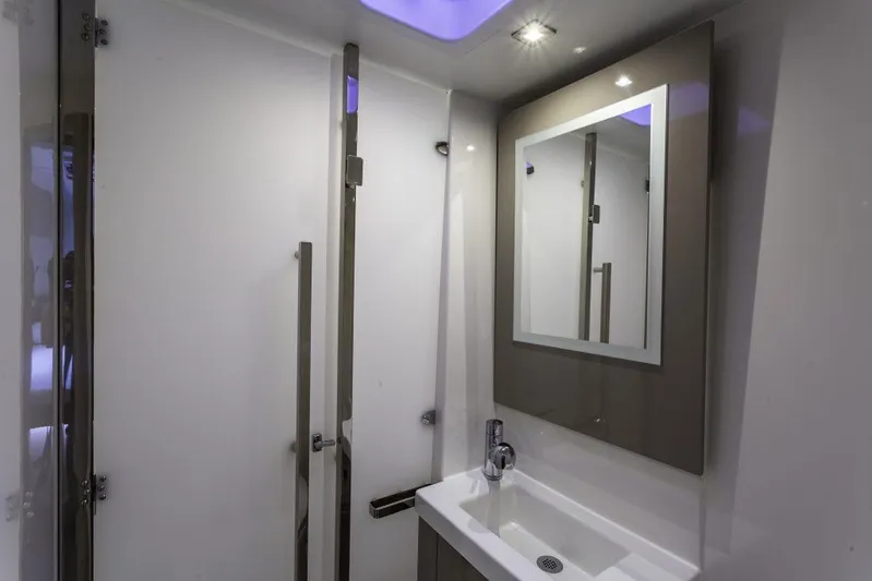 Pegasus Yacht Photos Pics Modern bathroom interior of 2022 Fountaine Pajot Astrea 42 yacht, featuring sleek design and fixtures.