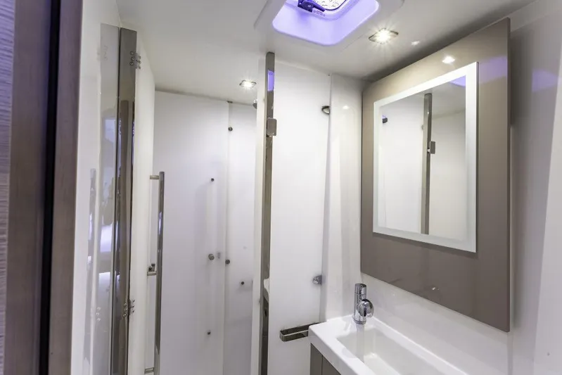 Pegasus Yacht Photos Pics Modern bathroom interior of 2022 Fountaine Pajot Astrea 42 yacht, featuring sleek design and fixtures.