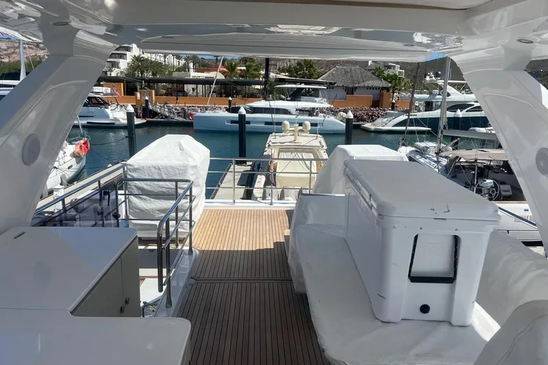 Al&Iacute;a Yacht Photos Pics Luxurious 2025 Azimut Fly 60 yacht deck with marina view.