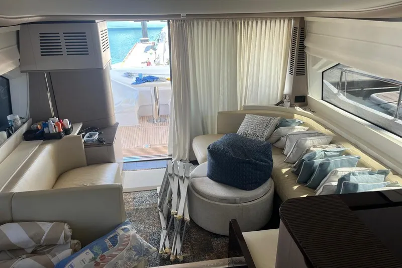 Al&Iacute;a Yacht Photos Pics Luxurious interior of 2025 Azimut Fly 60 yacht with elegant seating and ocean view.