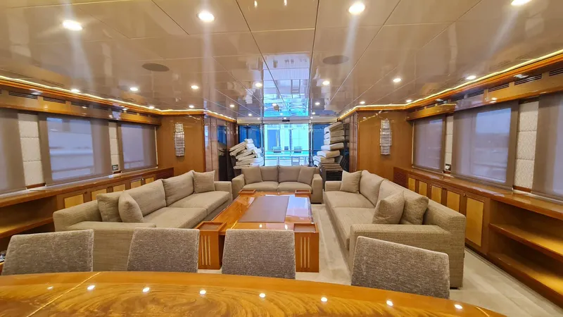  Yacht Photos Pics Luxurious yacht interior with plush seating, wooden accents, and ambient lighting, Custom 46 M, 2018.